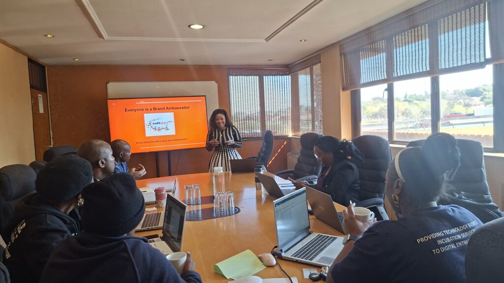 Founders attending a presentation in the main boardroom