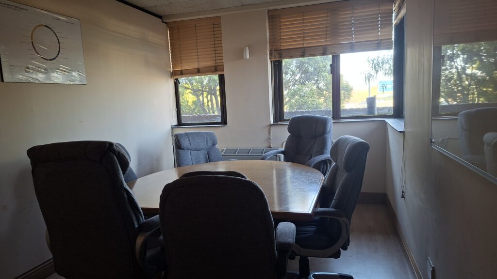 Compact meeting room with a round table