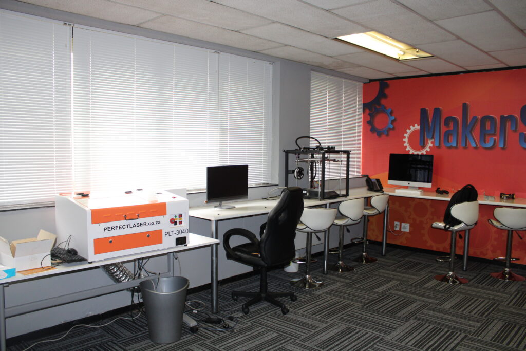Maker-space with workstations, 3D printer and laser cutter